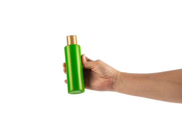 Green shampoo bottle in hand isolated on transparent background