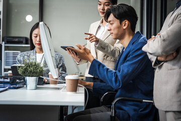 Asian colleagues meet at a desk, discussing business financial terms, investment strategies,...
