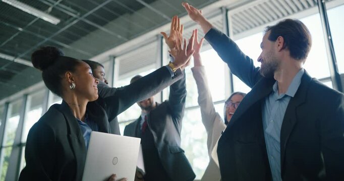 Team of Managers and Employees Having a Successful Meeting Right in the Hallway. Diverse Male and Female Specialists Making a Group High Five to Celebrate Results of a Financial Report