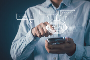 
Chatbot chat AI concept.Businessman using chatbot in smartphone intelligence Ai.