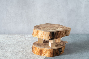 Cross sections of apple tree trunk as a pedestal for bottles, jars, flacons for medicine, spa, cosmetics.