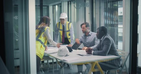 Civil Engineer and an Architect Making a Presentation for a Construction Project Tender in Front of a Financial Institution Representatives. Architectural Bureau in Talks of Building a Modern Hospital