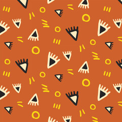 Endless abstract african pattern with beige black and yellow geometric shapes, circles, and lines on a brown background. Tribal mudcloth background in warm tones.