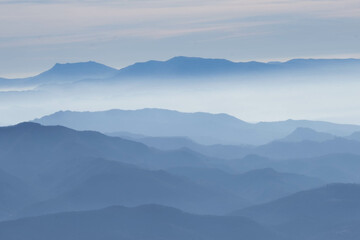 Obraz premium Shadows of mountains at blue hour