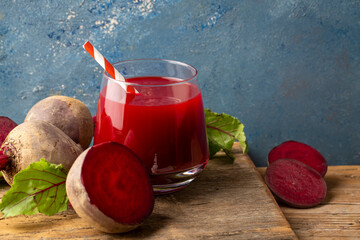 Glass of fresh beetroot juice with vegetables