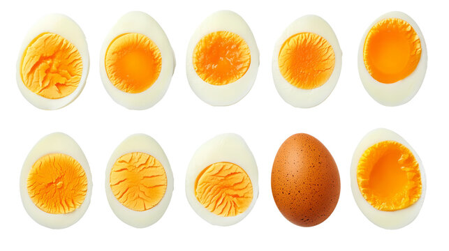 A collection of boiled eggs cut in half isolated on white