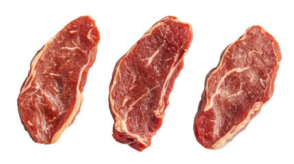 Fototapeta premium Three raw beef steaks, ready to be cooked.
