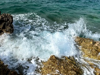 waves crashing on rocks