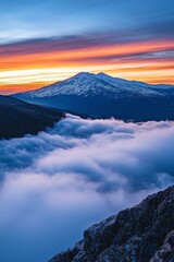 Beautiful snow capped mountain with sea of clouds during sunrise 