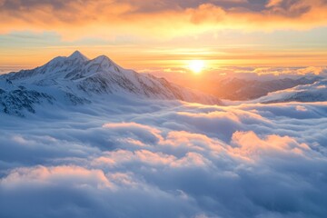 Beautiful snow capped mountain with sea of clouds during sunrise 