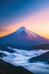 Beautiful snow capped mountain with sea of clouds during sunrise 