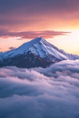 Beautiful snow capped mountain with sea of clouds during sunrise 