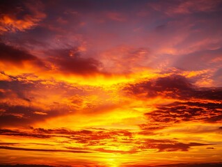 A blazing sunset with the sky aflame in shades of orange, red, and gold.