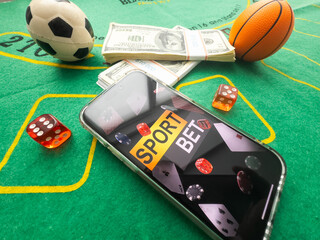 Smartphone, money, playing cards and chips. Online casino