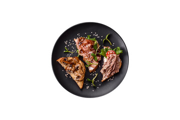 Variation of several toasts or bruschetta with prosciutto, mushrooms and veal
