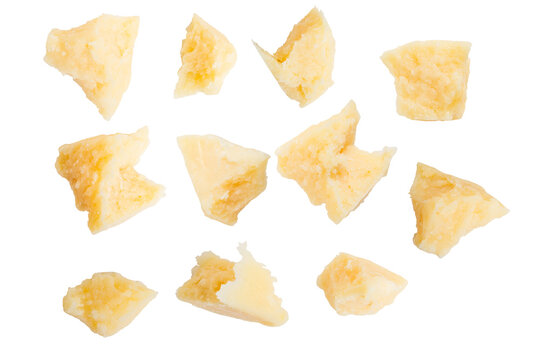 Pieces of parmesan cheese on a blank background. Set