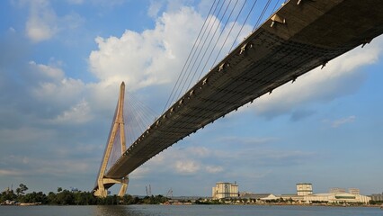 Bottom view of Can Tho cable-stayed bridge beetween Vinh Long city and Can Tho city, Mekong Delta Vietnam in sunset. 
Perspective from Hau river.