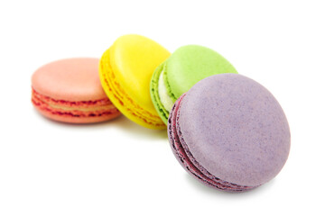 Sweet colorful varied assortment macarons cookies with filling isolated on a white background. Handmade traditional sweets. Clipping Path.