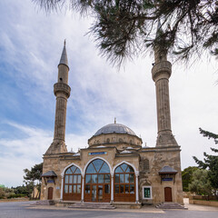 Sehitler Mosque, or Mosque of the Martyrs in Baku, Azerbaijan, features two tall minarets and an...