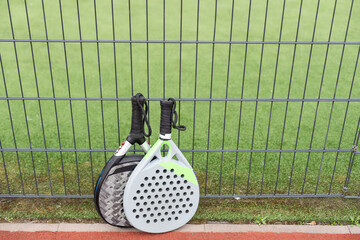 Close up image of paddle tennis rackets
