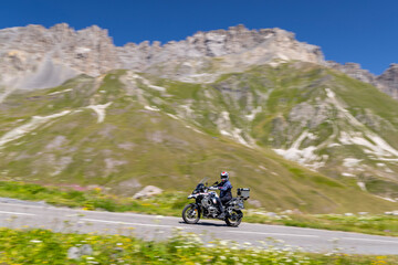 Motorbike on route des Grandes Alpes near Col du Galibier, Hautes-Alpes, France