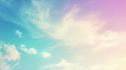 Fototapeta premium A serene sky scene with pastel colors blending seamlessly, featuring delicate clouds against a cyan to pink gradient.