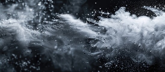 Abstract powder splattered background freeze motion of white powder bursting or scattering. Copy space image. Place for adding text and design