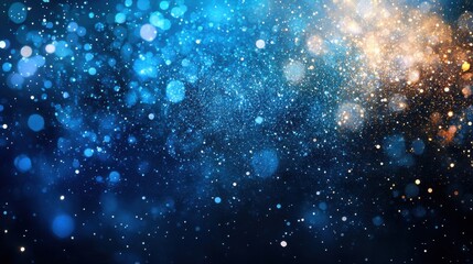 Obraz premium A dreamy, abstract bokeh background with shimmering blue and gold lights.