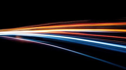 Dynamic multicolored light streaks create a motion blur effect on a dark background, symbolizing speed and technology. Ideal for futuristic and energetic designs.
