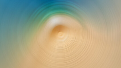 A blurred, circular motion effect image featuring soft tones of blue, green, and beige, resembling a serene abstract scene with a calming gradient.
