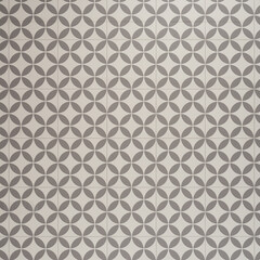 Fototapeta premium Geometric Patterned Tile Design with Gray and White Circular Motifs