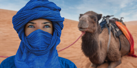 woman with a camel in the desert