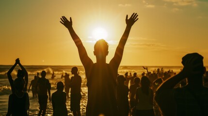 Celebratory beach crowd silhouetted against a golden sunset, with a central figure raising their arms in joy and admiration of the stunning view.