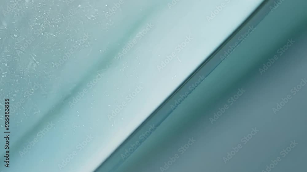 Poster abstract background formed by a diagonal line dividing a glass surface with water drops, creating a 