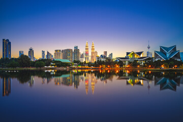 Skyline of Federal Territory of Kuala Lumpur by the Titiwangsa lake in Malaysia