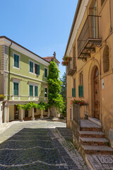 A street between old houses in Carovilli, a village in Molise in Italy.