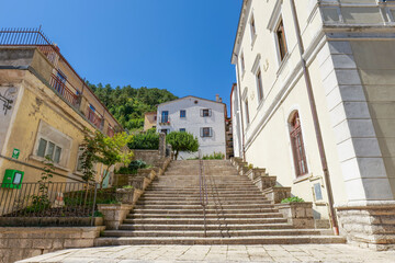 A street between old houses in Carovilli, a village in Molise in Italy.