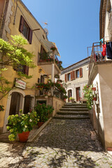 A street between old houses in Carovilli, a village in Molise in Italy.