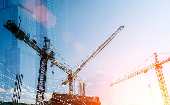 Construction technology banner background. Construction site with cranes, fittings and concrete.