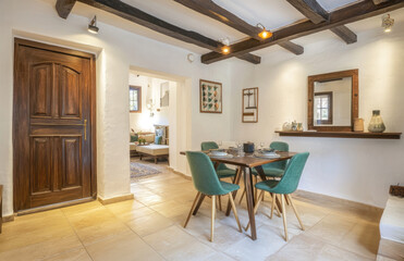 Fototapeta premium Stylish and bright apartment in the old town of El Caroga. Created with AI