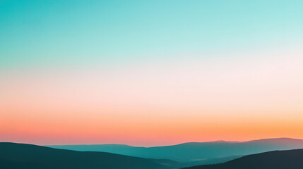 Obraz premium beautiful gradient sky at sunset with silhouette of mountains