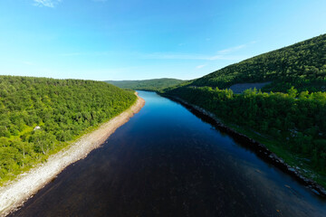 Karasjohka river seen from above as an aerial footage. Karasjohka river runs between Norway and Finland in Lapland