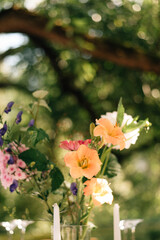 beautiful wedding decor. tables under the tree in the garden