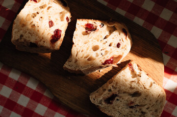 homemade cranberry bread on a board