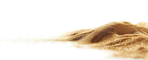 A mound of sand sits alone on a white backdrop, its sharpness and clarity enhanced by natural light.