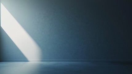 Dark empty room with a single beam of light, a moody and minimalistic background for introspective and dramatic designs

