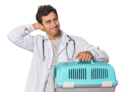 Young Hispanic man as vet with cage touching back of head, thinking and making a choice.