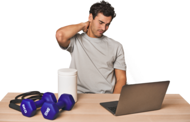 Hispanic trainer planning workout suffering neck pain due to sedentary lifestyle.