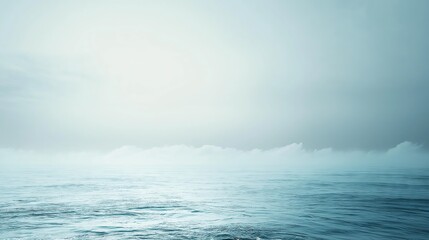 Fototapeta premium Calm ocean with misty waves under a pale sky, a serene and atmospheric background for marine and tranquil themes