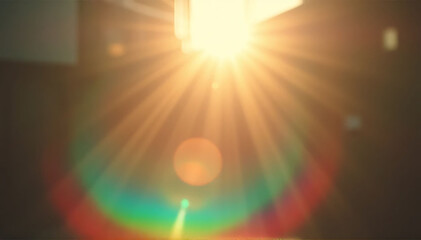 Light pours from a warm, bright rainbow in blur on a black background with a dusty texture. Use this defocused, abstract, damaged, scratched, retro cinema analog effect as a screen filter or overlay f